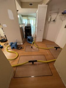 Water Damaged wood flooring floor drying mat system